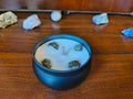 white candle with raw pyrite