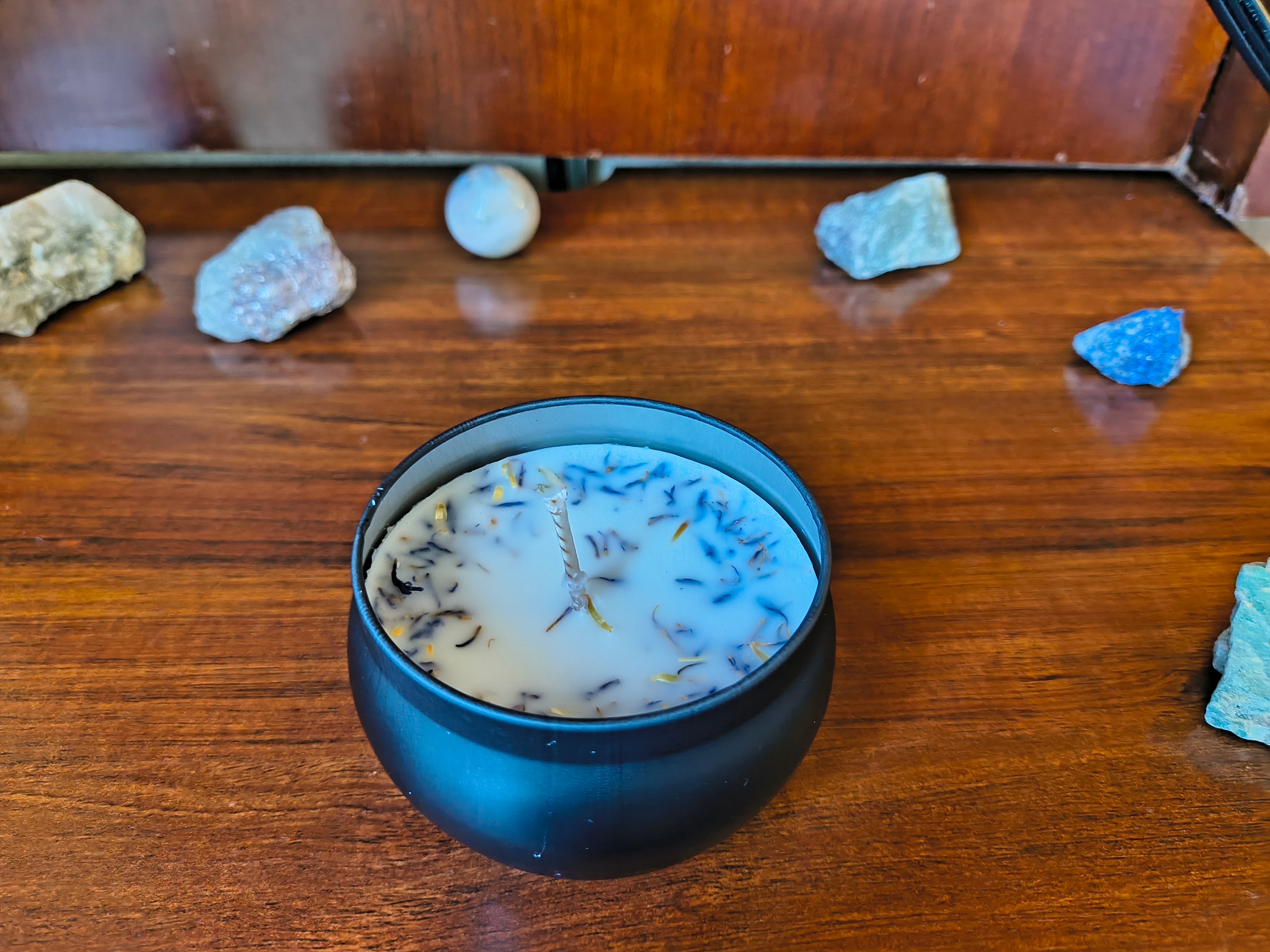 white candle with cornflower