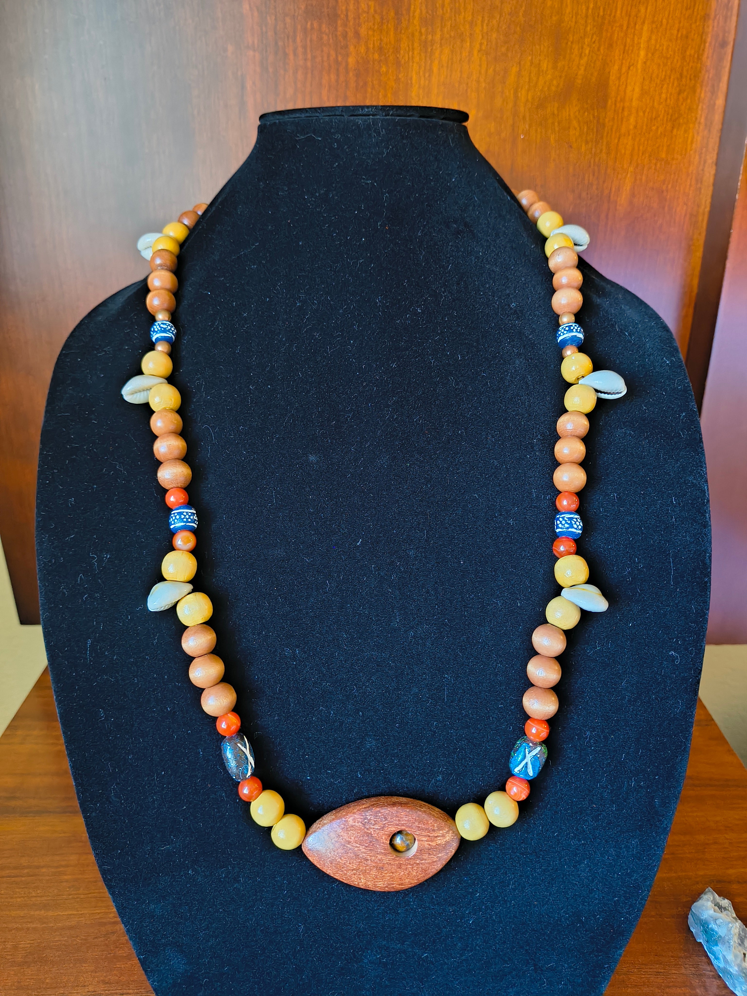 Wooden bead necklace with shells