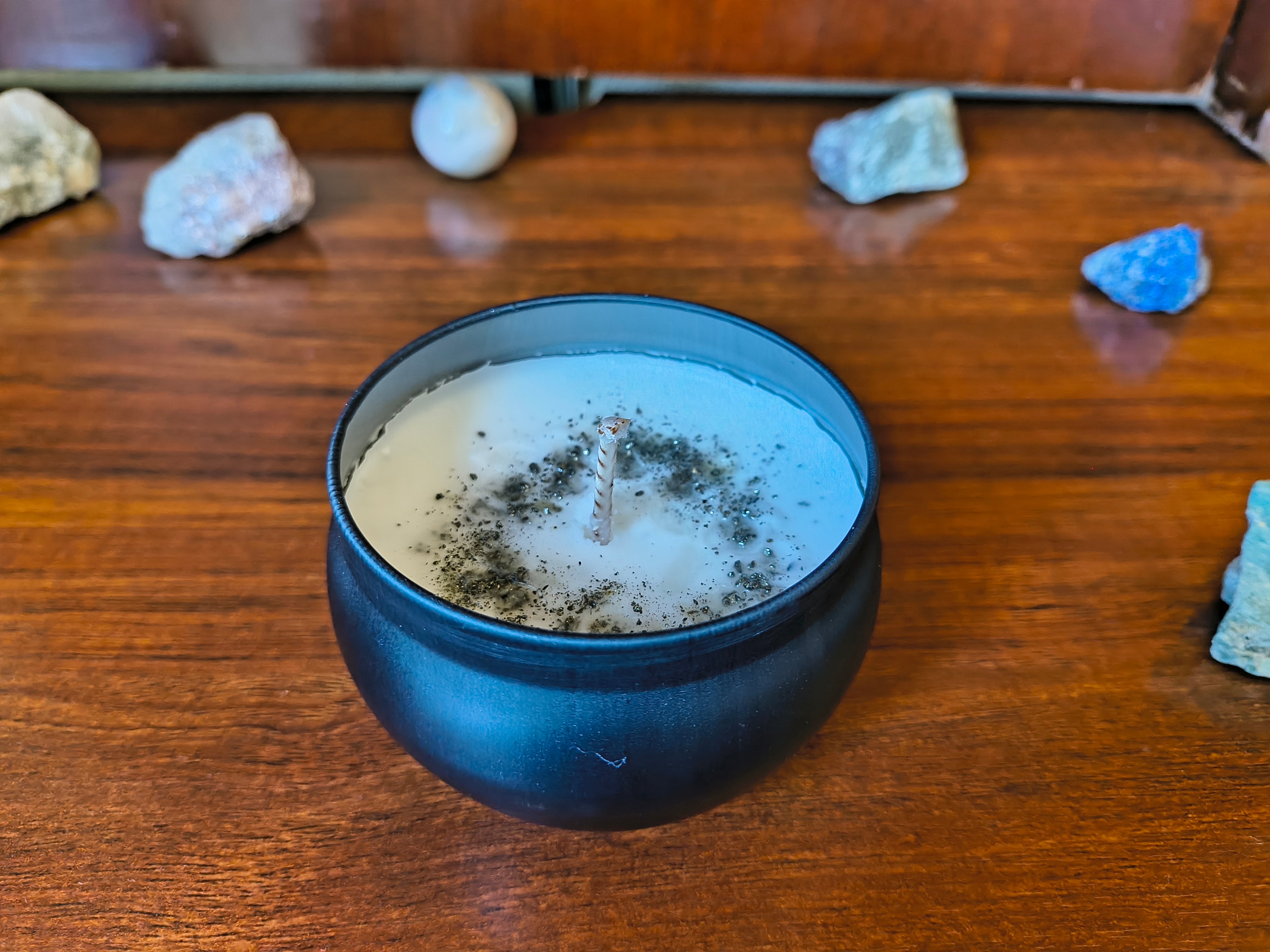 White candle with pyrite