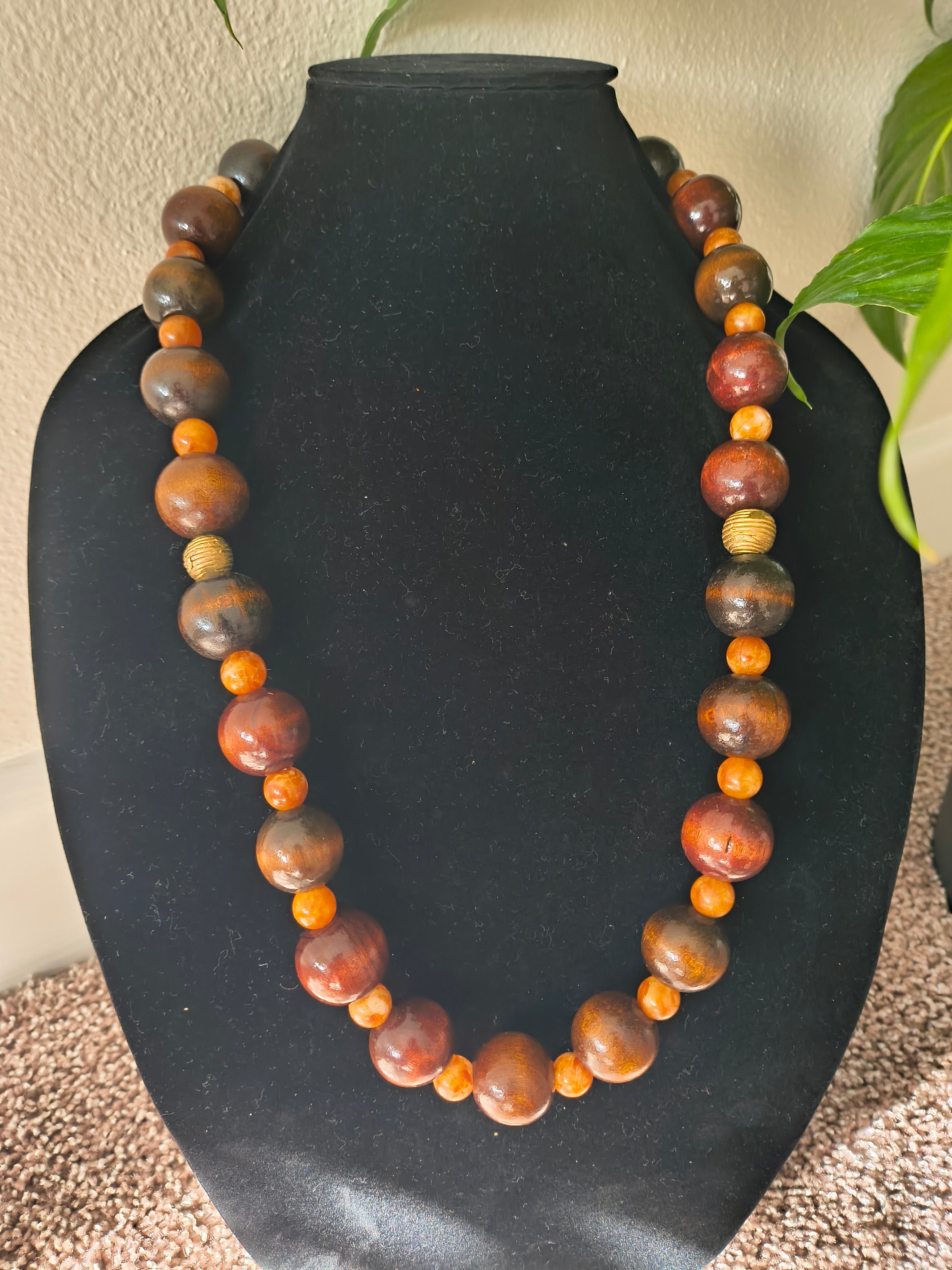 Dark wood and orange bead necklace