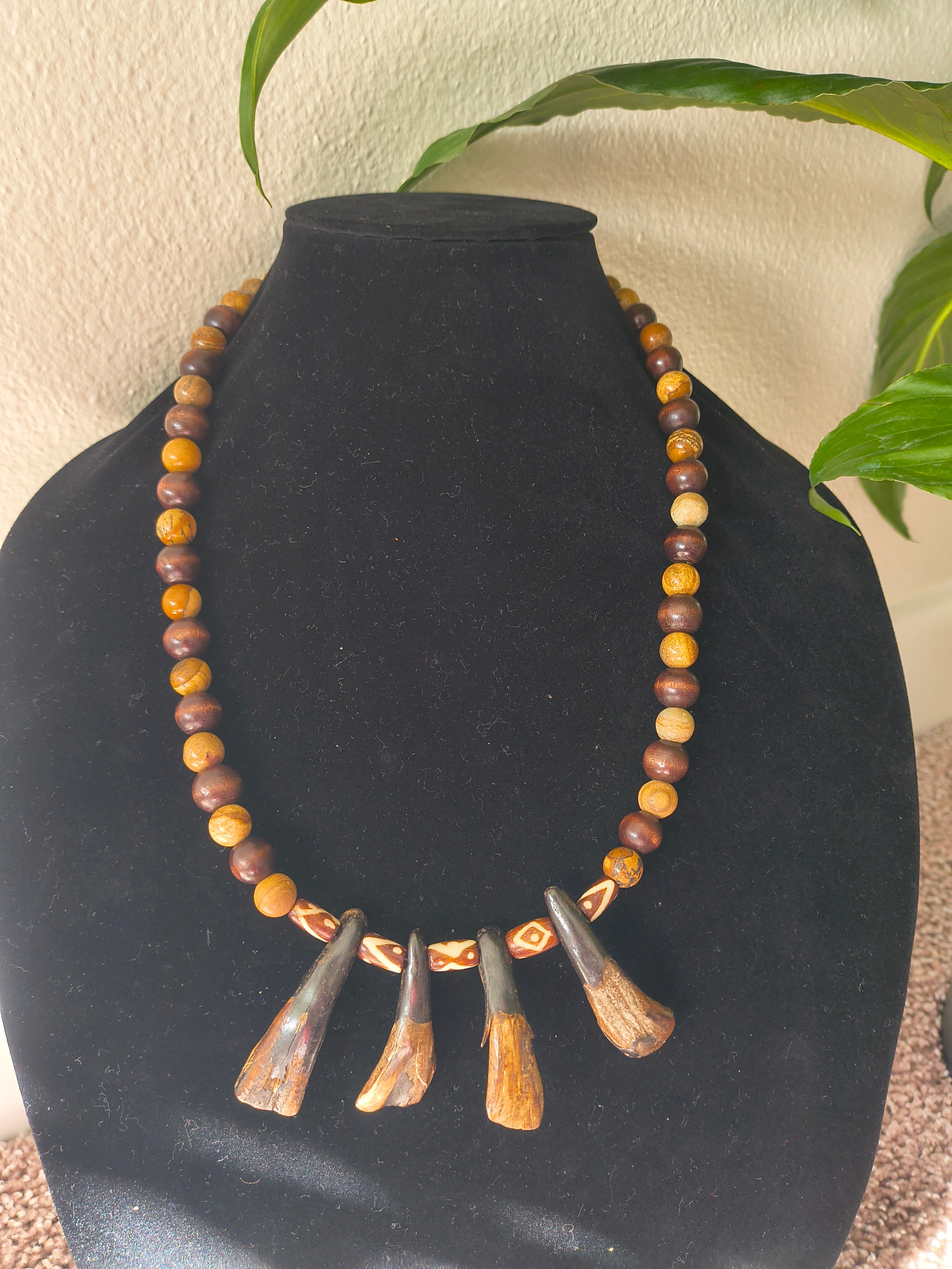 Picture jasper crystal beads and dark wood beads with buffalo teeth