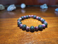 Lava stone and purpurite crystal bracelet